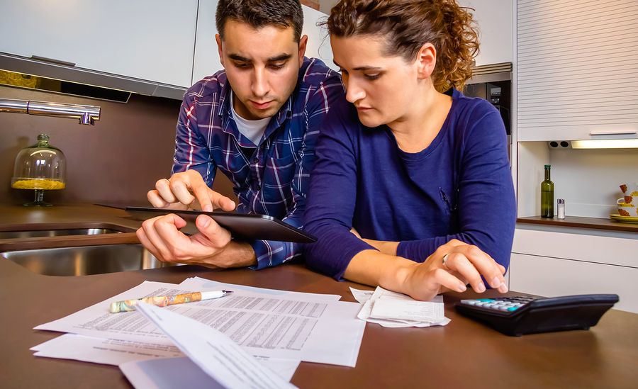 Couple looking over their montly bills